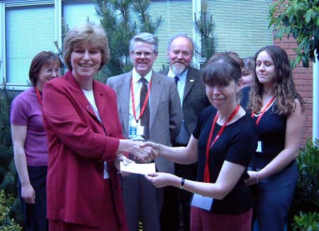 Ann presents a cheque to Marilyn Rydström, PDSA's Director General